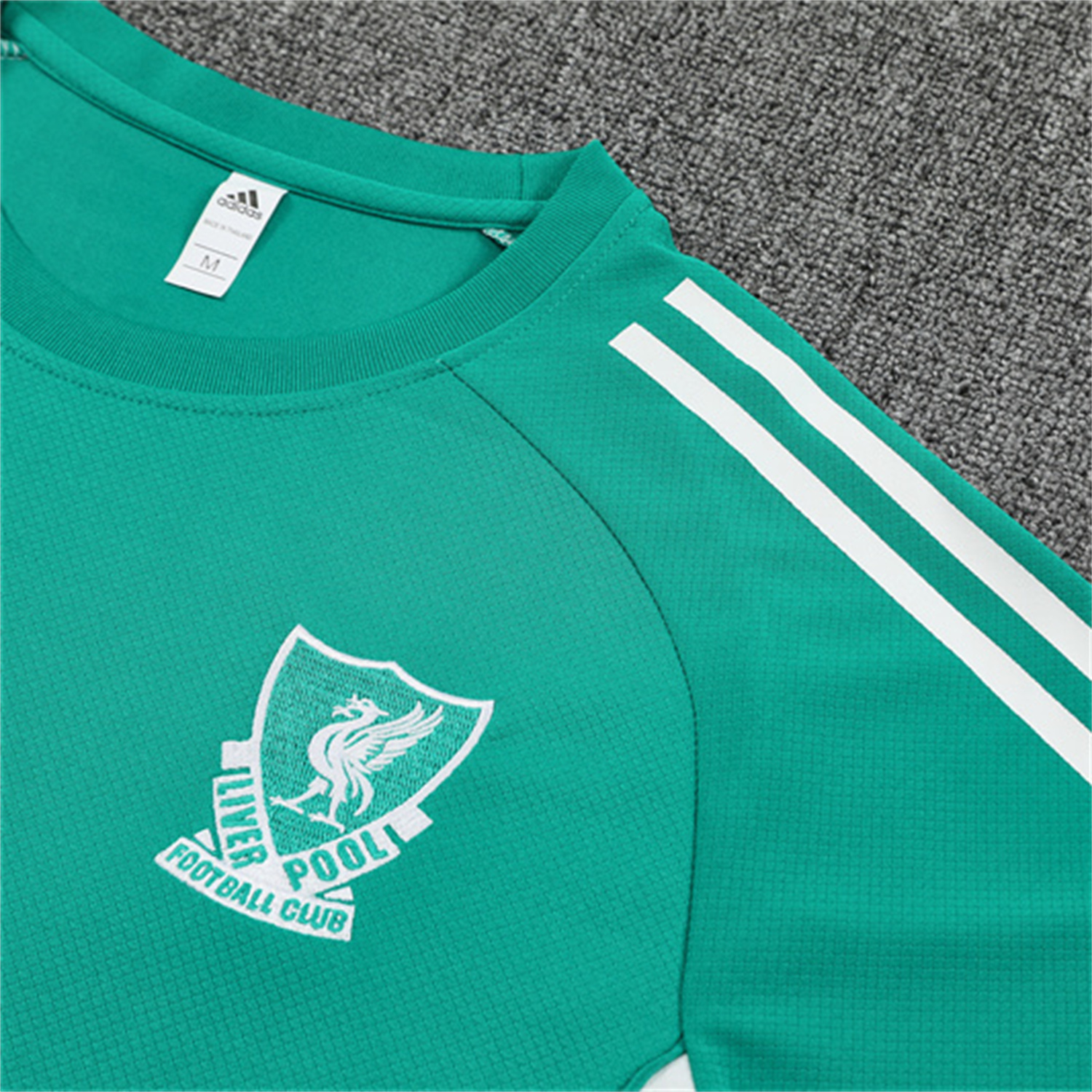 TKH-turbokithub-Liver.pool 25-26 Kids Short-Sleeve Training Set - Green Top & Black Shorts