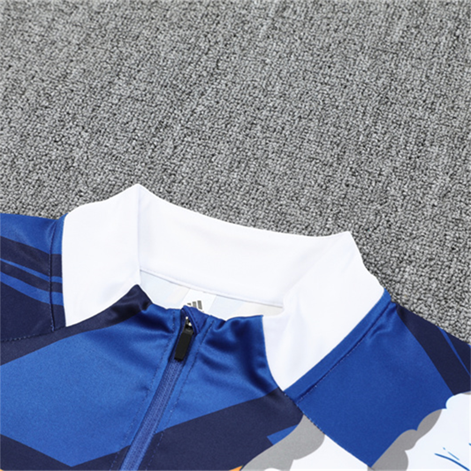 TKH-turbokithub-Real Madrid 25-26 Long Sleeve Training Set - Yellow, White and Blue Camouflage Top and Black Pants